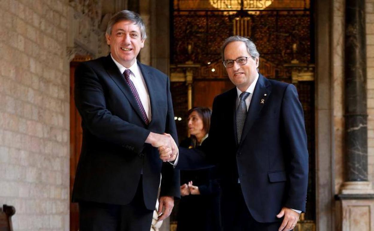 Jan Jambon y Quim Torra.