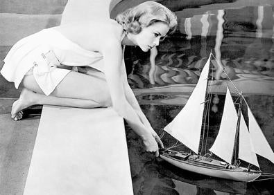 Imagen secundaria 1 - Grace Kelly junto a Clark Gable, con quien vivió un romance, en 'Mogambo'. La actriz en 'Alta sociedad' y 'La ventana indiscreta'.