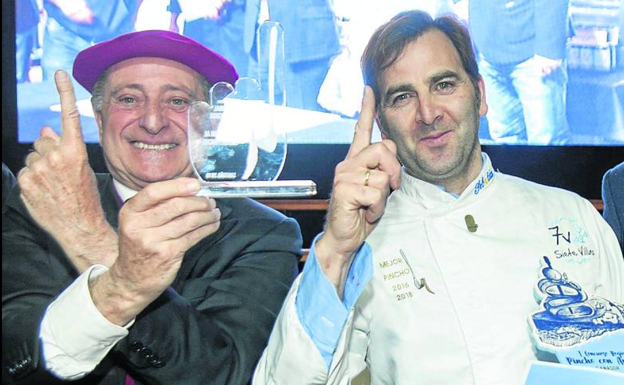 Tino Sampedro, de la Cofradía, junto a Sebastián Larralde. 