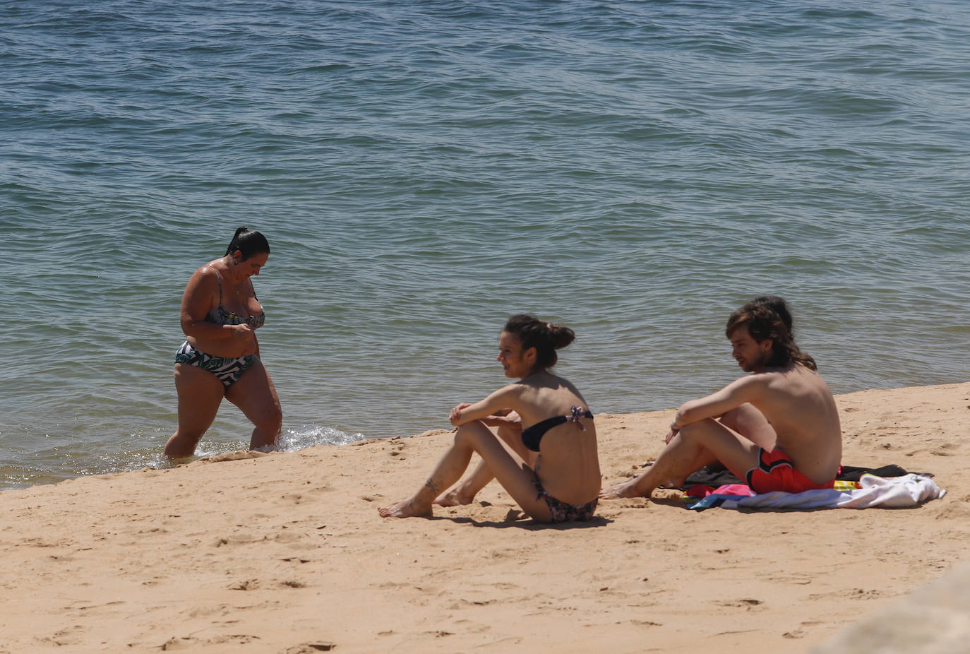 Fotos: El buen tiempo llena las playas