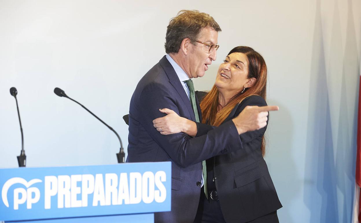 Feijóo y Buruaga en un acto con afiliados del PP celebrado en Santander.