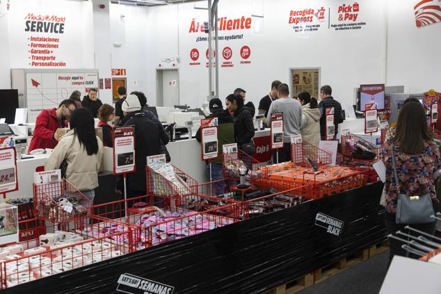 Fotos: Colas para comprar en el Viernes Negro