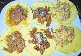 Tacos de cochinita pibil, de pastor y de huevo a la mexicana.