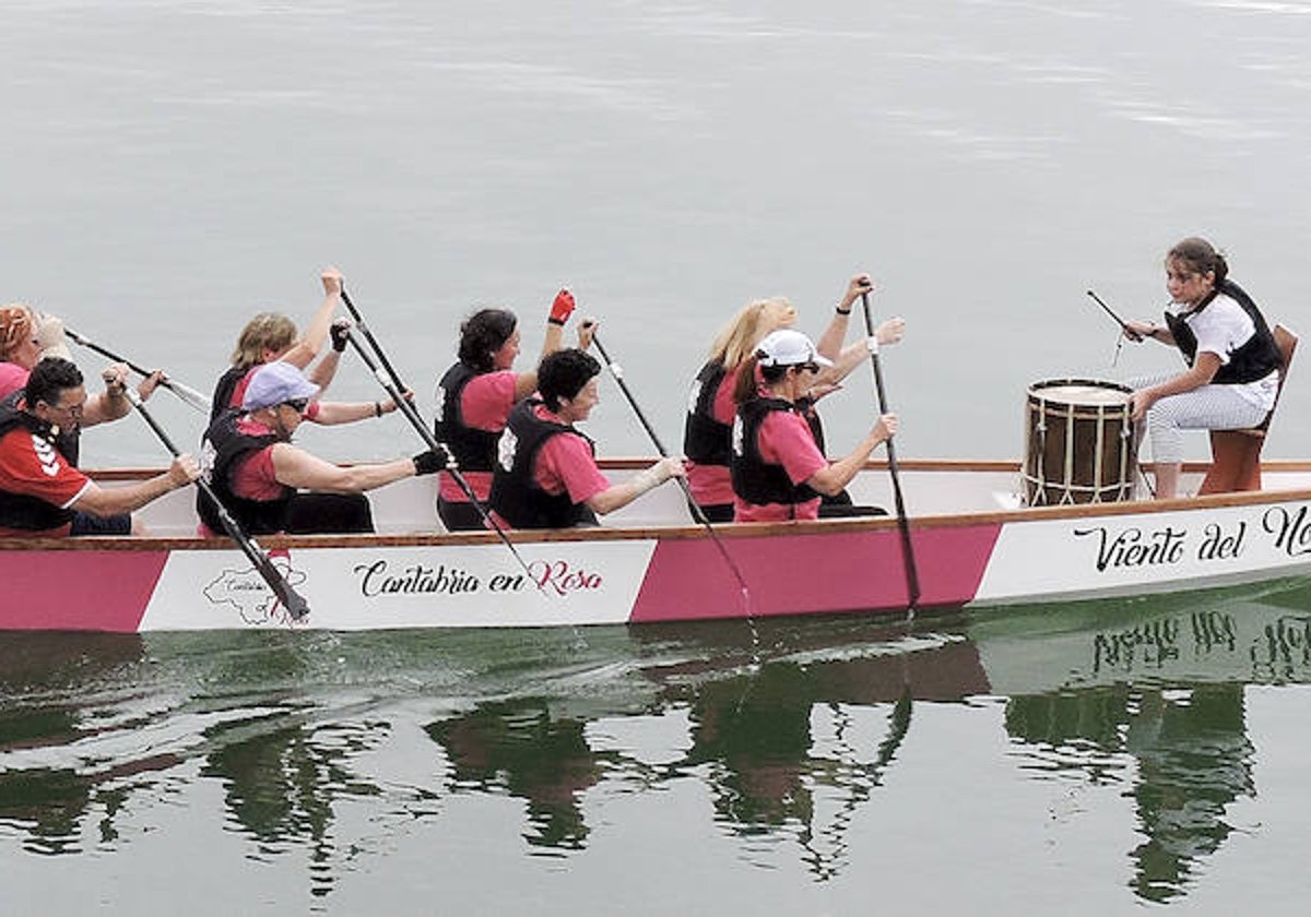 Barco Dragon Boat de Cantabria en Rosa.