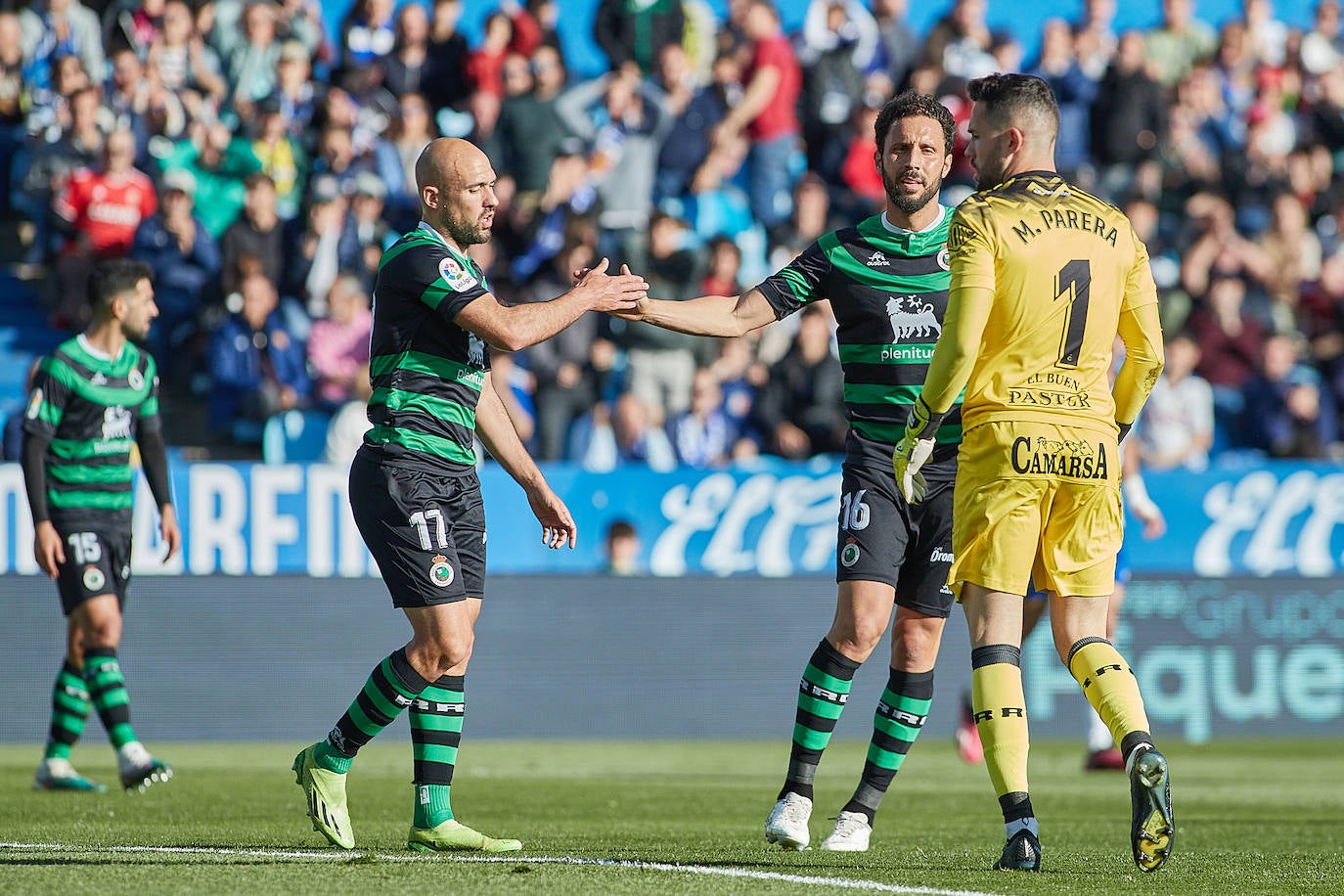 Unai Medina, Germán y Parera, durante el encuentro