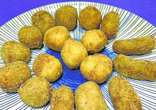 Croquetas de bacalao, jamón y carne de cocido.