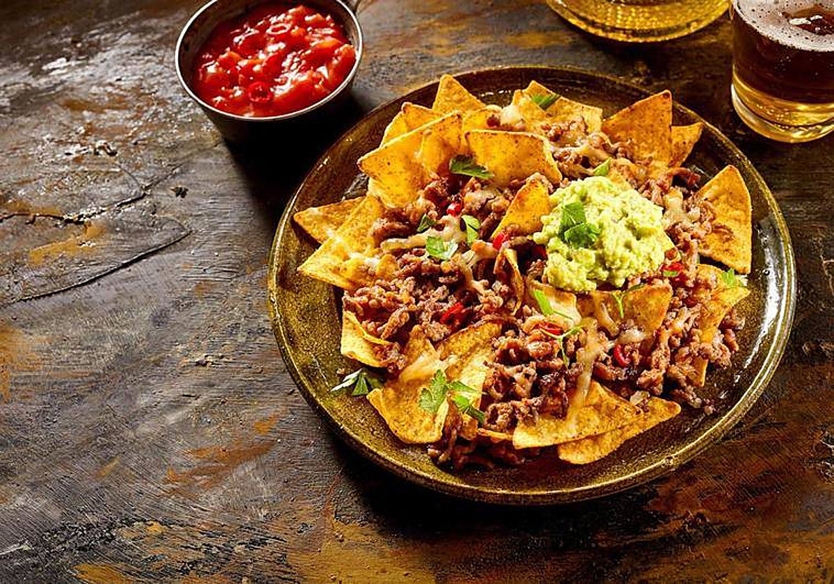 Unos nachos de carne son un aperitivo cada vez más actual.