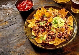 Unos nachos de carne son un aperitivo cada vez más actual.