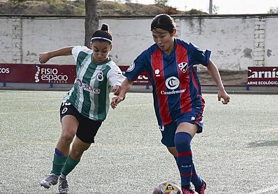Ana y Yuki, durante un lance del encuentro.