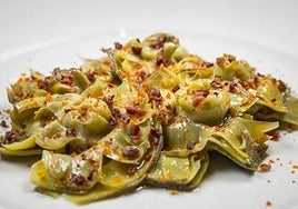 Alcachofas confitadas con virutas de jamón ibérico.