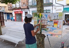 Participante pintando en las calles de Santoña en la pasada edición del concurso.