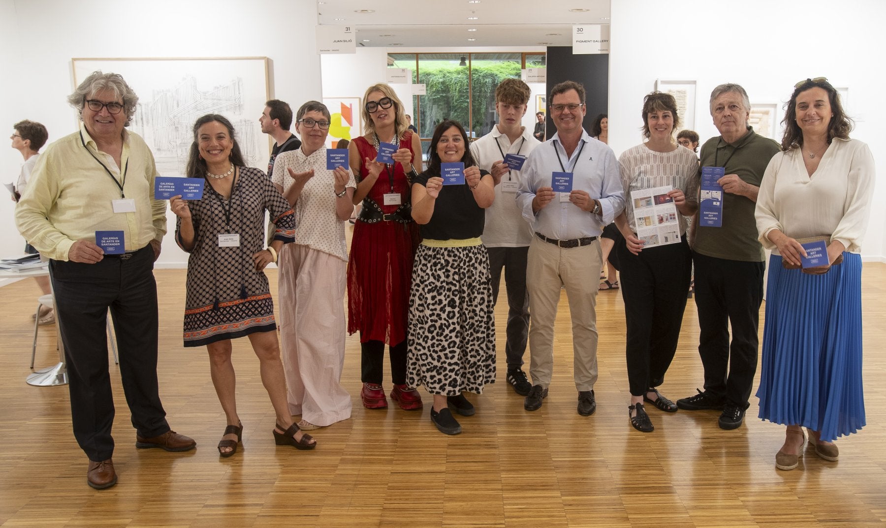 De izquierda a derecha: Manuel Sáenz Messia, Lidia Gil, Mónica Álvarez Careaga, Casilda Pérez del Molino, Noemí Méndez, Pablo y Juan Silió, Alexandra García, Juan Riancho y Yolanda Egoscozabal, en el Palacio de Exposiciones.