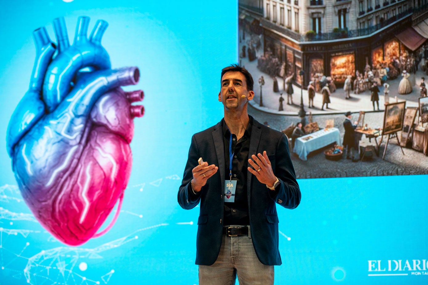 Jorge Calvo, investigador en IA, con una de las diapositivas de fondo que le han servido para ilustrar los cambios en la sociedad.