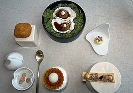 Aperitivos: croqueta; la vaca y la ostra; mantequilla; crema de sardinas; bacalao a la montañesa; salchichón.