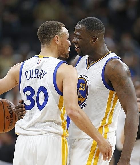 Stephen Curry y Draymond Green. 