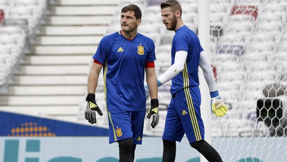 Casillas entrena junto a De Gea. 