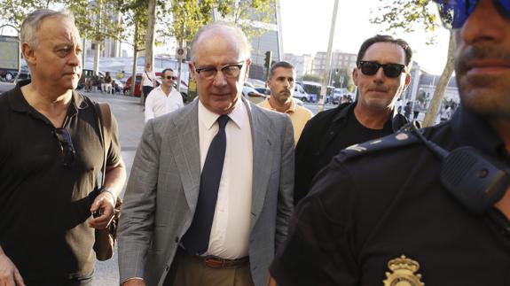 Rato, a su llegada a los juzgados.