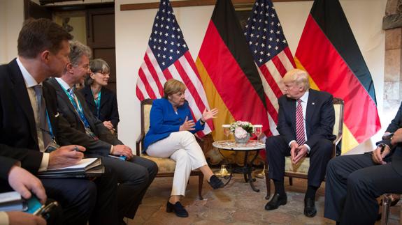 Merkel y Trump, durante la reunión del G7.