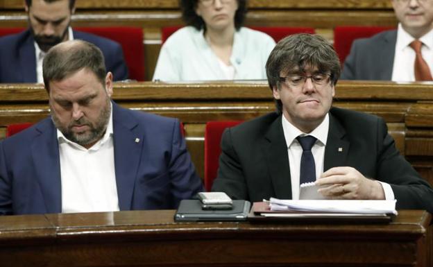 Oriol Junqueras y Carles Puigdemont.