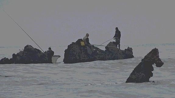 Grupo de pescadores.