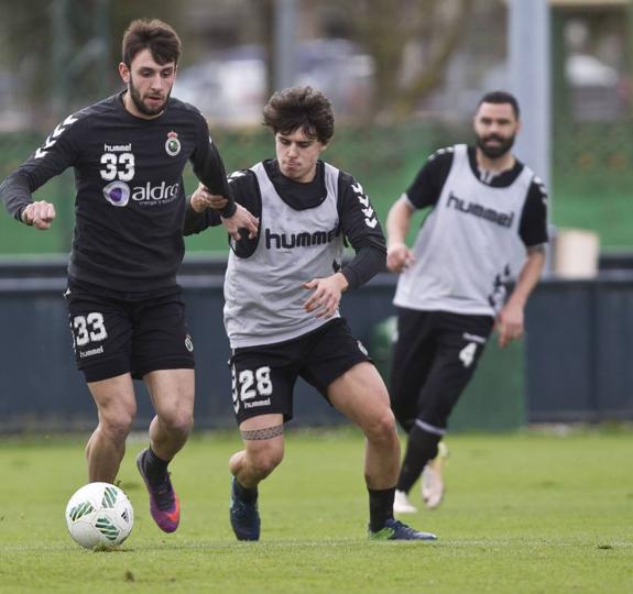 Javi Cobo (izquierda), junto a Josemi, en un entrenamiento de esta temporada.