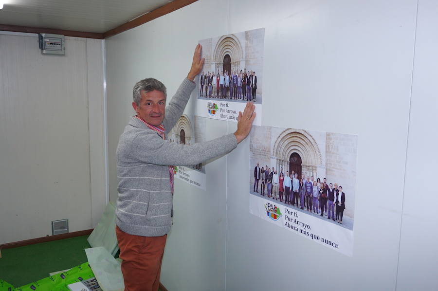 Fotos: Pegada de carteles e inicio de la campaña de las elecciones municipales en Arroyo de la Encomienda