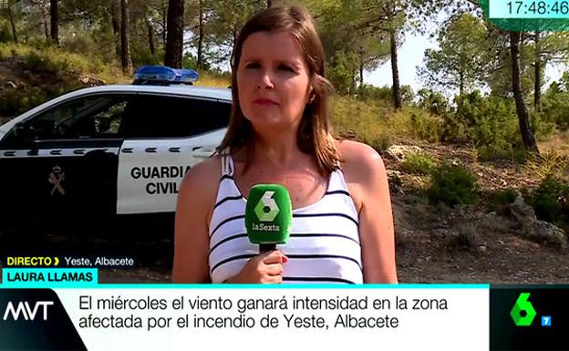 Laura Llamas cubriendo la información del incendio. 