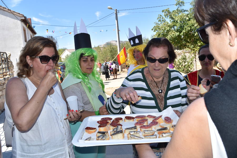 La localidad palentina celebró la fiesta de su patrón, San Lorenzo con un gran recorrido por las calles