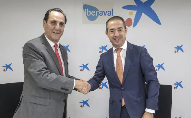 José Rolando Álvarez, presidente de Iberaval y José Manuel Bilbao director territorial de CaixaBank. 