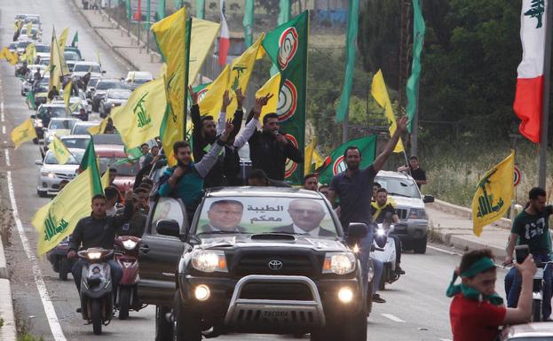 Simpatizantes de Hezbolá celebran los resultados. 