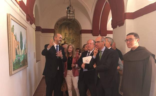 El presidente de la Diputación, el vicerrector y el prior, durante la inauguración. 