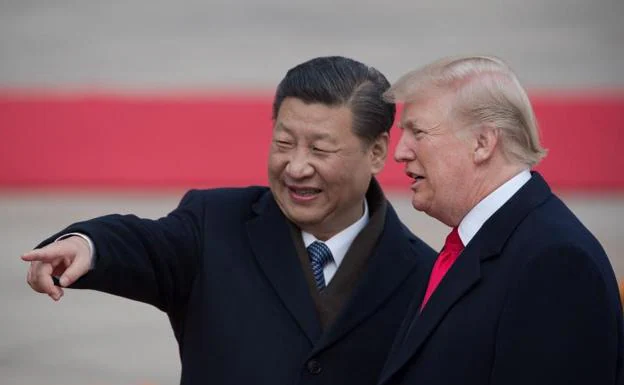 Los presidentes Xi Jinping y Donald Trump. 