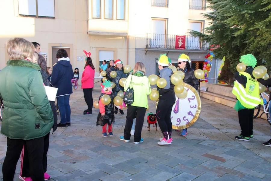 Fotos: Vistosa San Silvestre en Torquemada