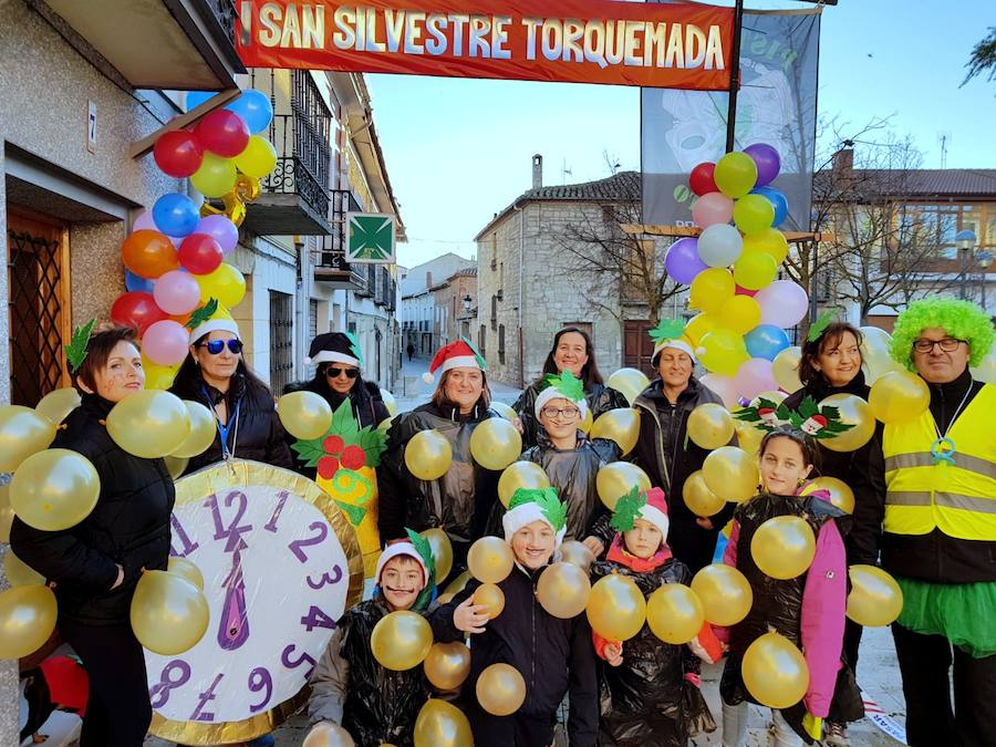 Fotos: Vistosa San Silvestre en Torquemada