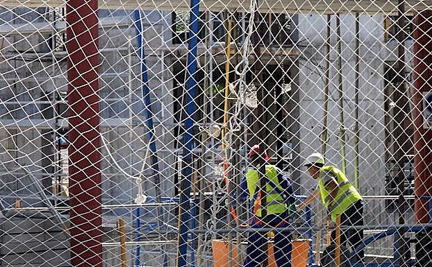 Trabajadores de la construcción. De Torre