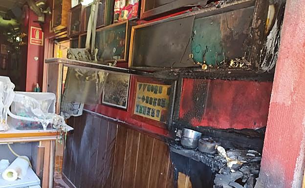 Imagen principal - Daños en el interior del bar. 