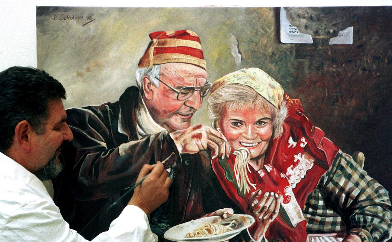 Un pintor alemán copia un cuadro. 