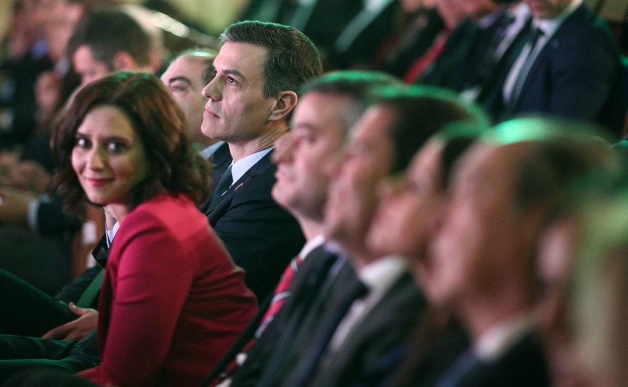 Pedro Sánchez e Isabel Díaz Ayuso, en un acto en Madrid.