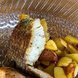 Rodaja de pescado con patatas