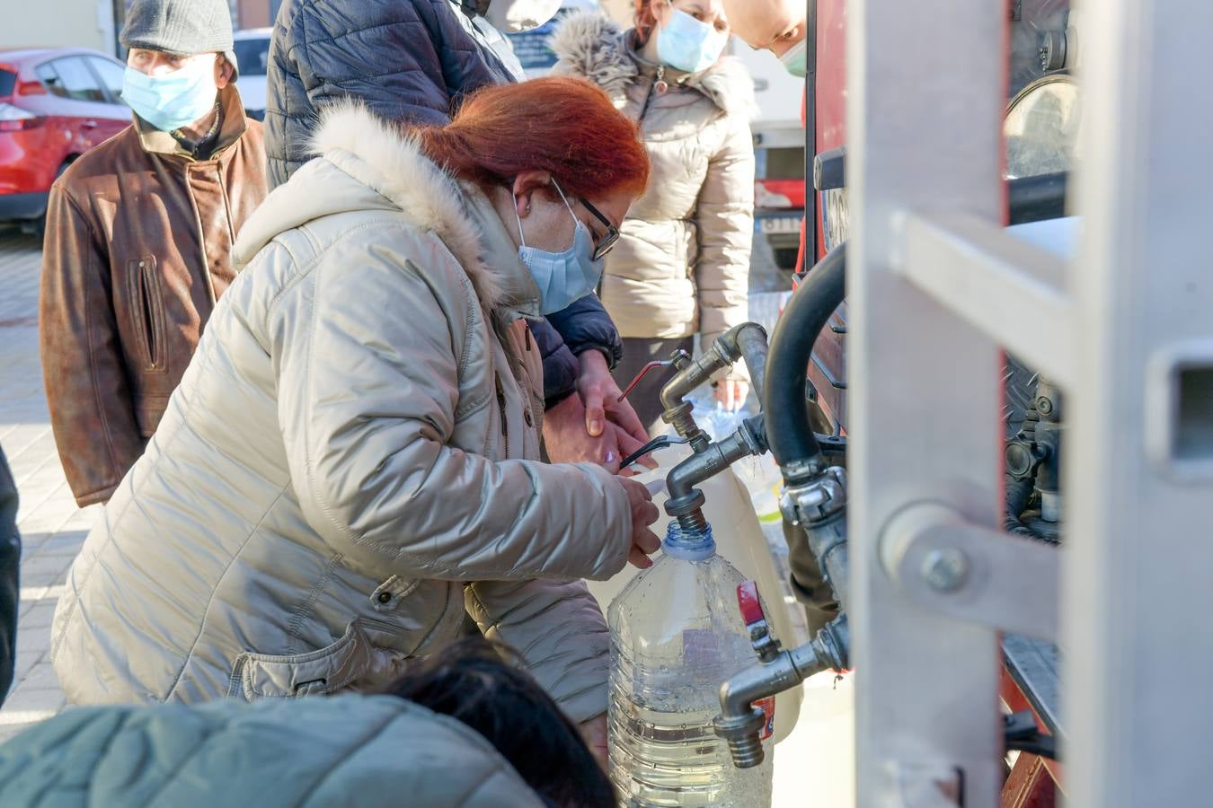 Fotos: Los bomberos reparte agua potable en Portillo