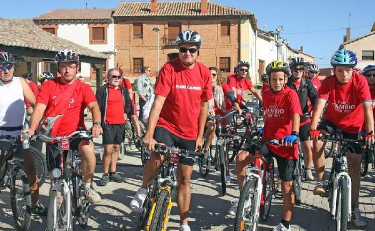 Óscar López, en 2011, en el centro, durante la campaña de 'Puro Cambio'