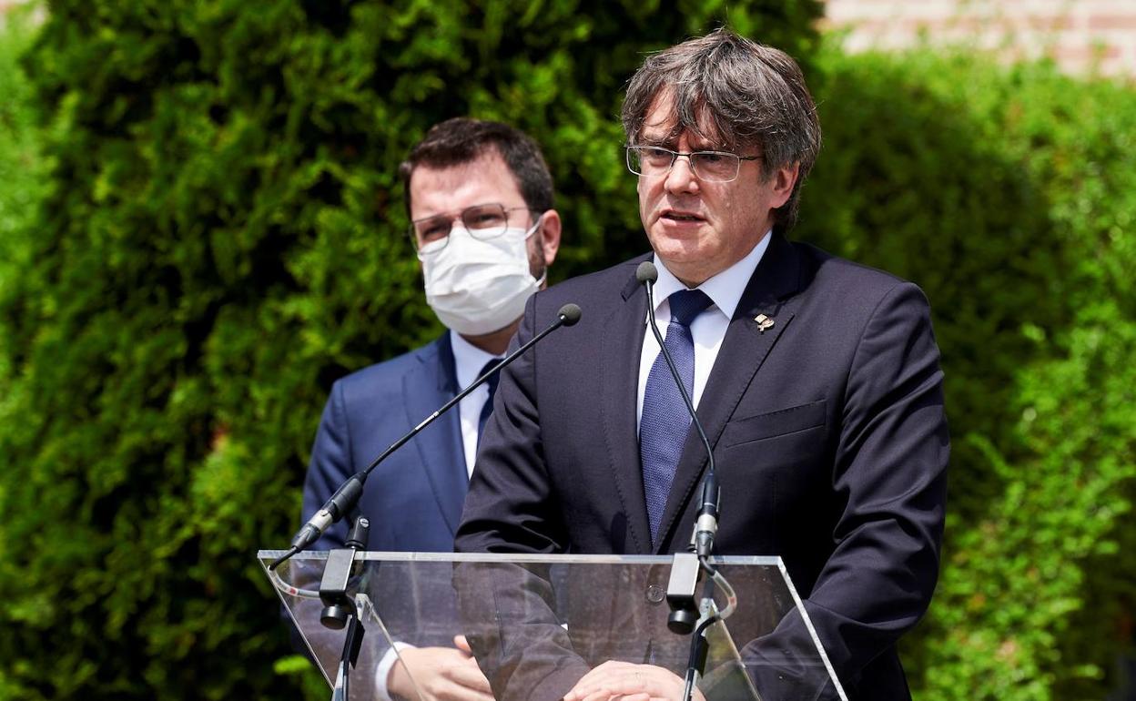 El presidente de la Generalitat, Pere Aragonès, y el expresident Carles Puigdemont, en una imagen de archivo. 