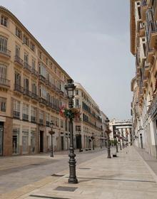 Imagen secundaria 2 - En la parte superior una imagen de la Gran Vía madrileña. La segunda fotografía, en la parte inferior izquierda la Gran Vía de Salamanca, una fotografía de Manuel Laya. En tercer lugar la calle Larios de Málaga, fotografía de Nito Salas.