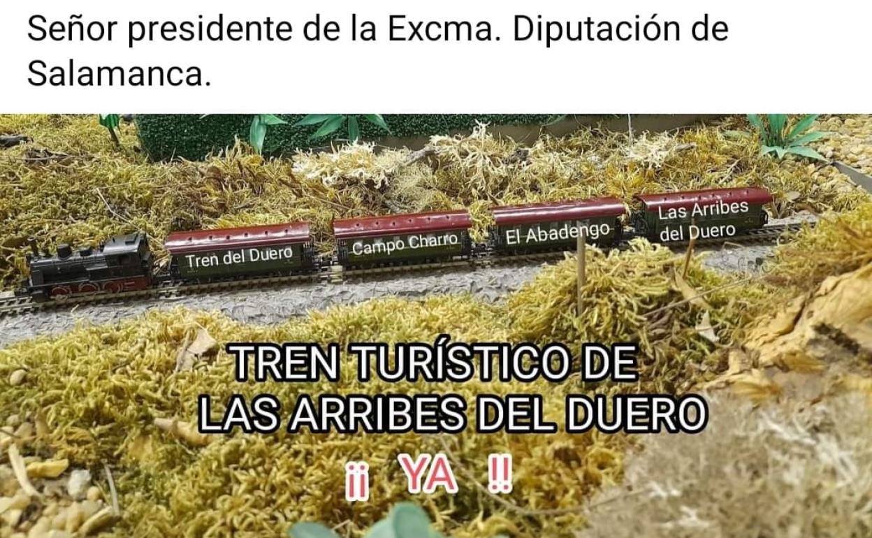 Montaje sobre la maqueta del Tren del Duero, solicitando al presidente de la Diputación la creación de un tren turístico.