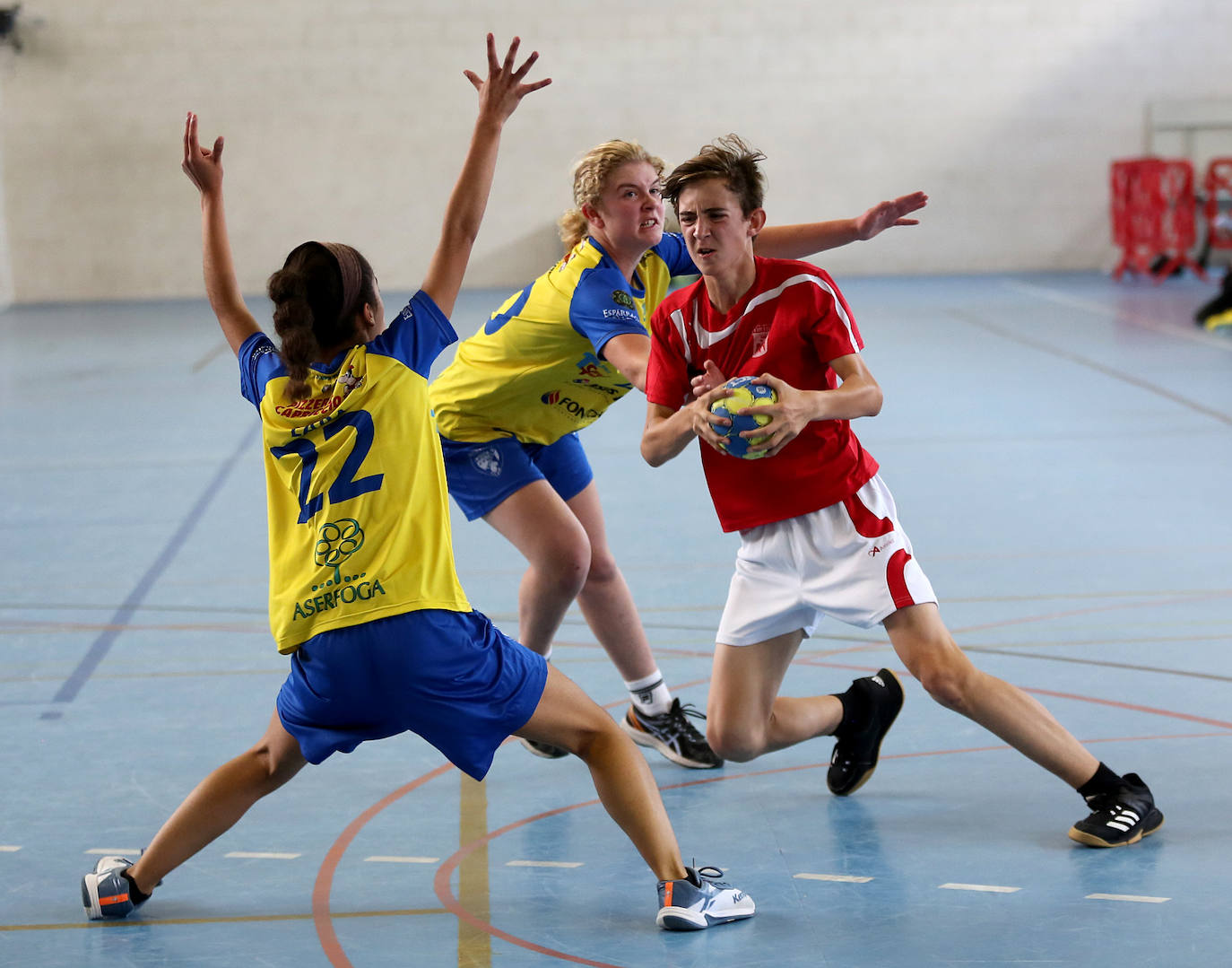Fotos: Octava jornada de la competición de balonmano de Juegos Escolares