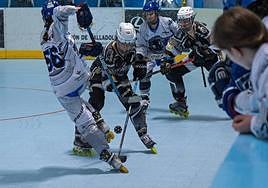 Una acción del partido entre el Munia y el Rubi.