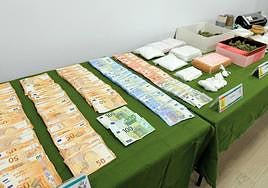 Dinero y sustancias estupefacientes incautadas en la operación Criança.
