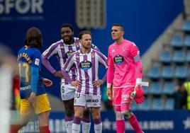 Boyomo, Iván Sánchez y Masip, con gesto cariacontecido tras la derrota ante el Andorra.