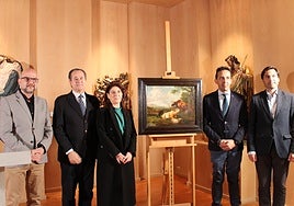 Autoridades y miembros del Museo de las Ferias junto al cuadro