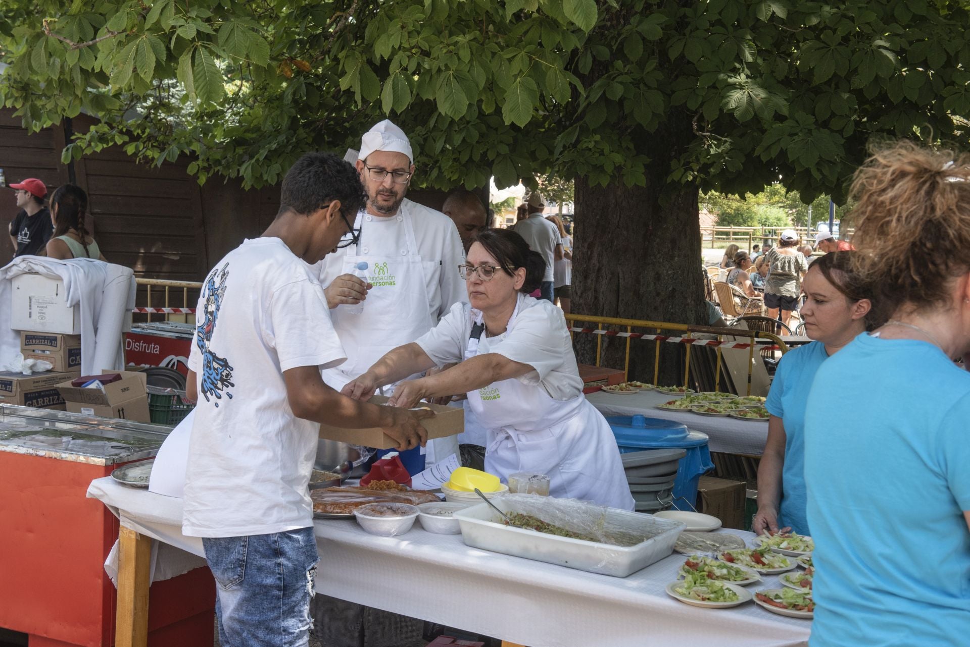 La paella popular de Apadefim, en imágenes